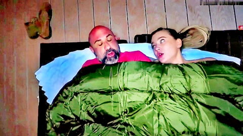 Stepdad warms cold stepdaughter in bed with surprised expressions