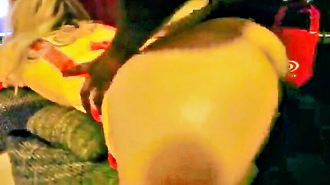 Black hand groping shiny oiled blonde's massive yellow ass cheeks from behind