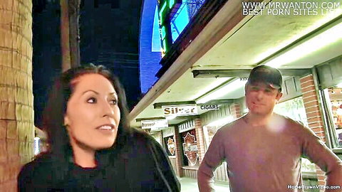 Smoking hot MILF smiling with pickup guy outside Vegas casino at night