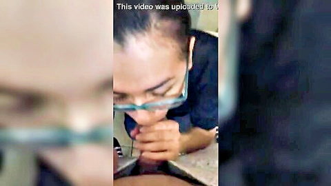 Dorky Asian subway employee giving blowjob in bath