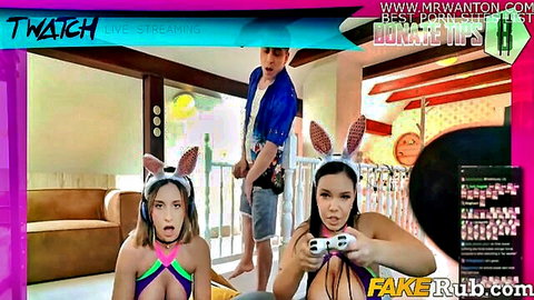 Busty gamer bunnies in free use threesome, blonde and brunette with controllers