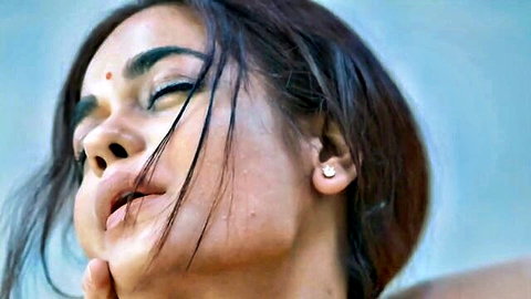 Sensual close-up of hot Indian MILF with sultry eyes and parted lips