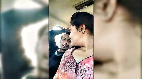 Sweet Indian couple intimate in car, romantic foreplay