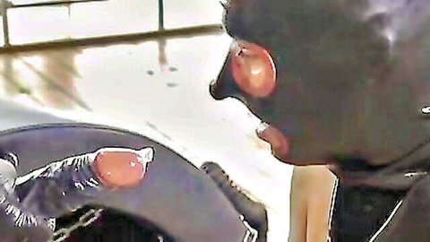 Latex gloved masked dom grips throbbing erect cock with precum in rough closeup