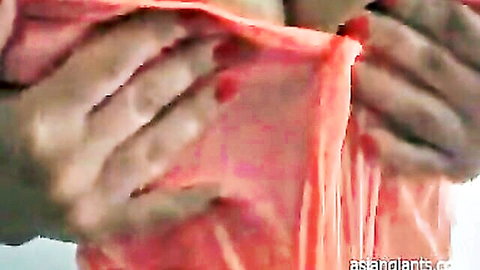 Japanese MILF's massive tits covered in cum from bukkake