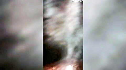 Blurry abstract hazy image with watermark overlay, no visible action