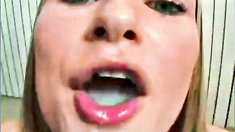 Blonde woman with open mouth and tongue in hypnotic trance close-up
