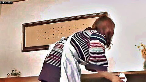 Asian maid in striped uniform bent over cleaning table showing round ass cheeks