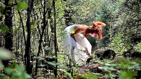 Redhead bride in white dress bends over in forest for outdoor squirting kink