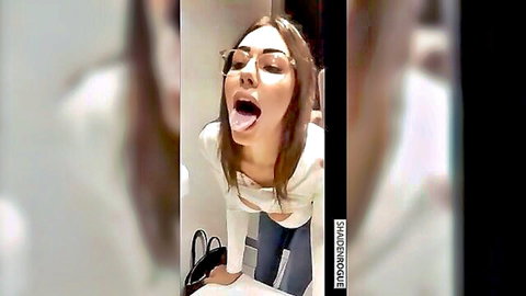 Shaiden Rogue sticks out tongue for public restroom blowjob tease