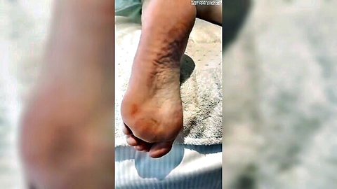 Girlfriend's hot sweaty foot soles after gym workout