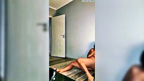 Nude ebony woman lying on floor with legs spread post-anal play