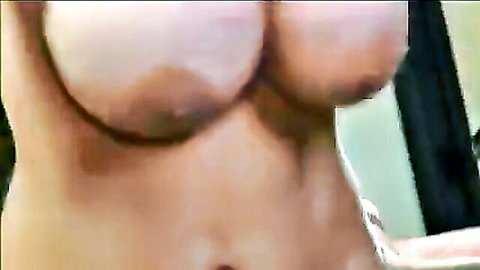 Electra Lamore mature topless with exposed breasts close-up
