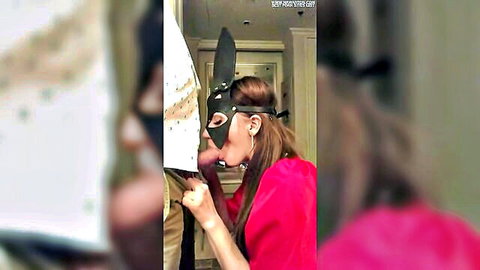 Brunette in bunny mask and red dress gives sloppy blowjob on knees