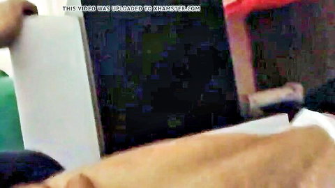 Dark blurred xHamster video player screen with upload watermark overlay