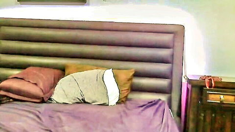 Empty bedroom with purple sheets teasing intimate NRI couple moments