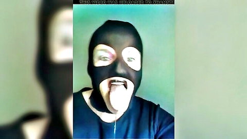 Mysterious masked figure sticks out tongue in teasing amateur thumbnail