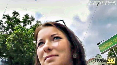 Brunette woman smiling outdoors in Hunt4K cuckold pickup scene