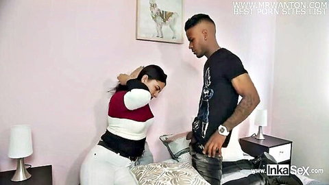 Latina babe with big ass bent over bed in tight pants as BBC guy grips her waist