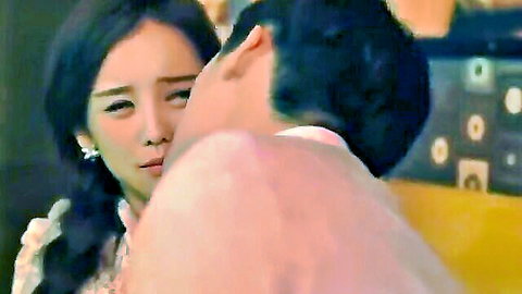 Korean star in romantic neck kiss with handsome man, intimate embrace