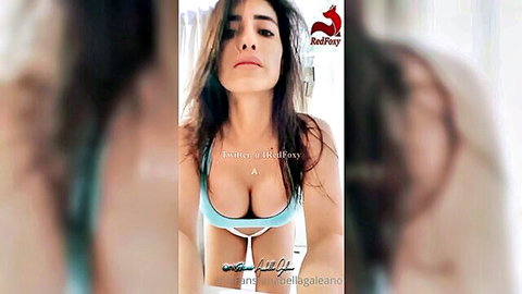 Anabella Galeano sexy selfie in teal top with deep cleavage