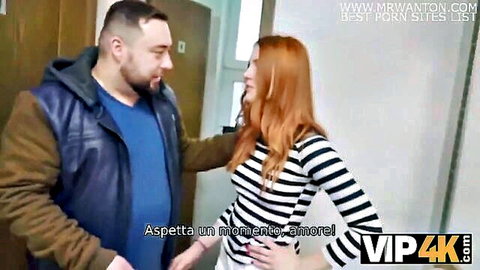 Redhead babe in striped top touched intimately by bearded guy in hoodie at doorway saying aspetta un momento amore