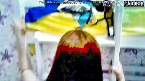 Amateur brunette with long straight hair posing from behind in fan-favorite video