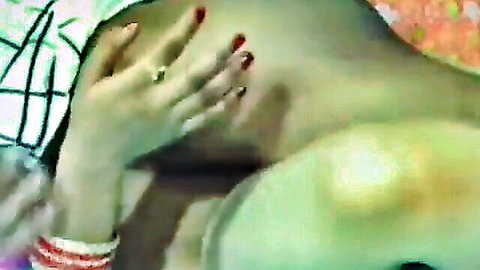 Ebony babe moaning intensely with red-nailed hands gripping her neck and shoulder in rough sex ecstasy
