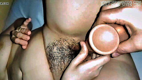 Hairy pussy close-up dildo insertion with realistic toy
