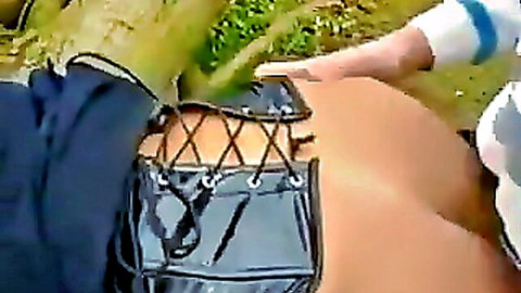 Busty German woman in black harness fucked outdoors in countryside