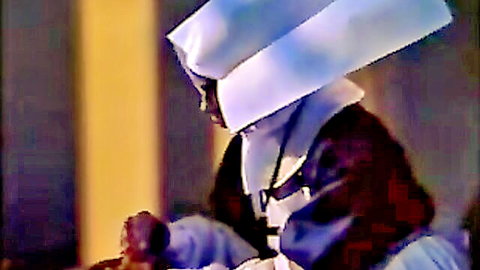 Seductive nun in white habit and black dress in perverse adult scene