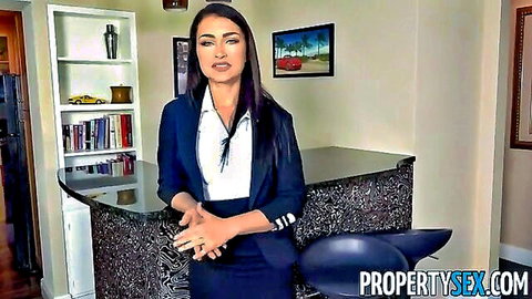Jennifer Jacobs as seductive real estate agent in tight skirt suit