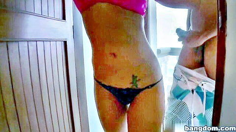 Michell in pink tube top and black thong touched by man on Bang Bus