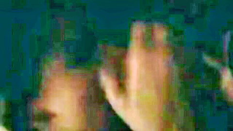 Blurry mature Malay woman in submissive pose, hands visible