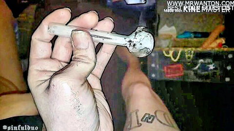 Hand holding glass pipe in tweaked cock sucking and rimming video