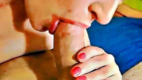 Close-up POV blowjob by blonde woman with pink nails on hard cock