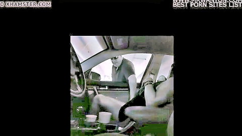 Woman spreads legs exposing shaved pussy to man in parked car outdoors