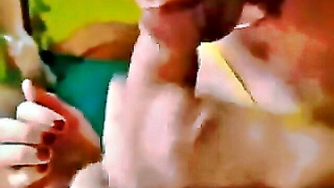 Blonde woman receiving throat cumshot in close-up oral scene