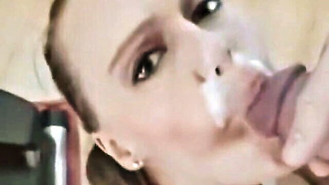 Blonde woman with cum on face and mouth during intense blowjob