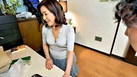 Chiyoko Kawabata 70yo mature Japanese woman smiling in sweater and skirt