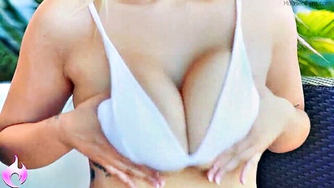 Chloe Surreal squeezing her big tits in white bikini top