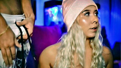 Blonde babe in pink beanie kneels for neighbor's cock on live cam