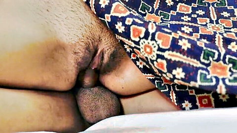 Close-up of hairy cock penetrating wet pussy during intense Indian couple sex