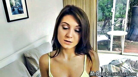 Brunette babysitter teen with small tits in yellow tank top seductively looking at POV camera on bed