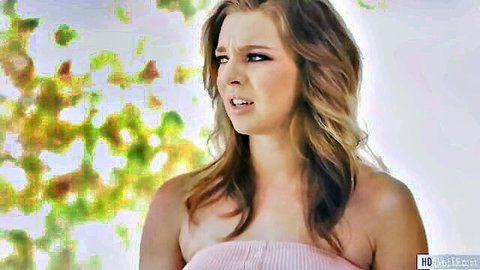 Tiffany Watson in pink tube top, surprised expression, ready for squirting fun
