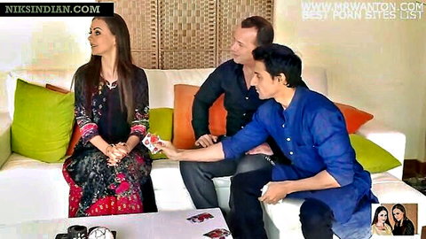 Sexy Indian MILF in embroidered dress teases threesome with two studs on sofa