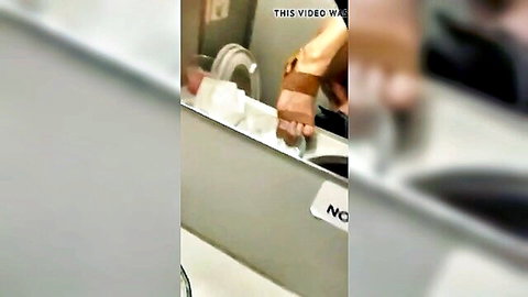 Blurry thumbnail of woman at sink in wedding attire, arms submerged in white foam