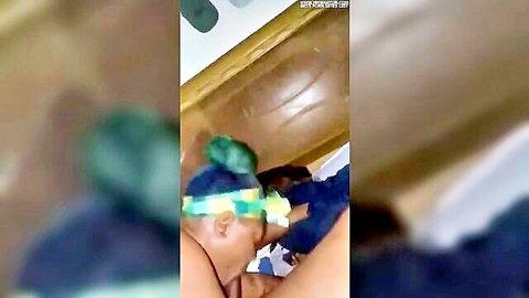Ebony woman in green headscarf performs oral on black man's cock in amateur 69