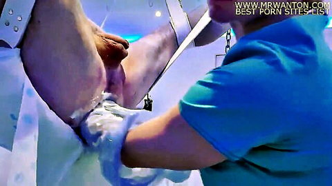 Extreme nurse fisting patient both hands elbow deep in medical fetish anal scene
