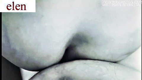 Close-up of curvy woman's nude ass and breasts in erotic side pose
